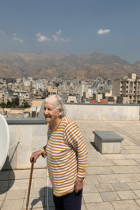 elderly lady with walking stick